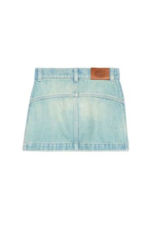 Gonna in denim lavato azzurro GUCCI KIDS | 772132XDCTU4452